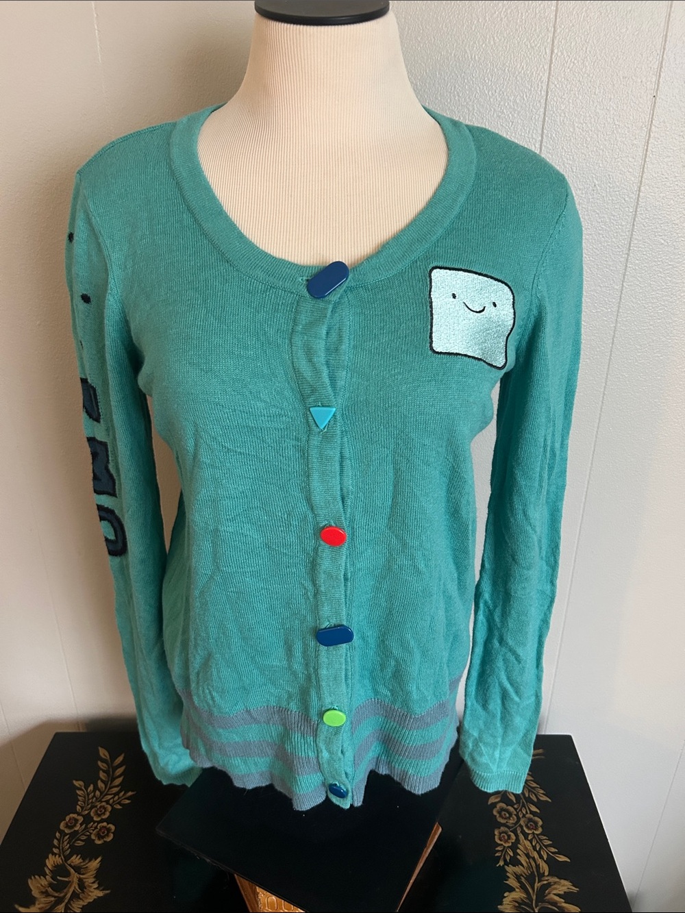 BMO sweater from Adventure Time with shaped buttons and BMO embellishments